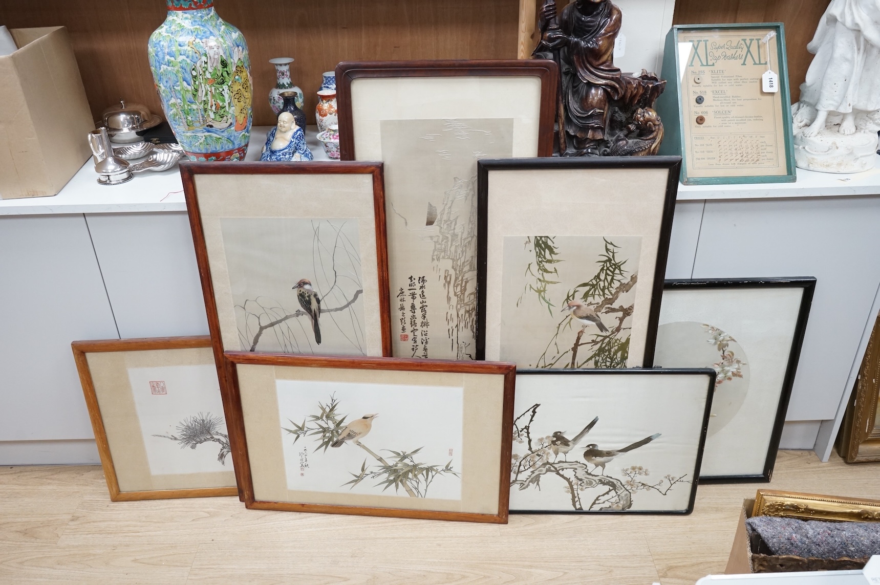 Seven Chinese embroideries on silk, mountainous landscapes and birds, largest 121cm high